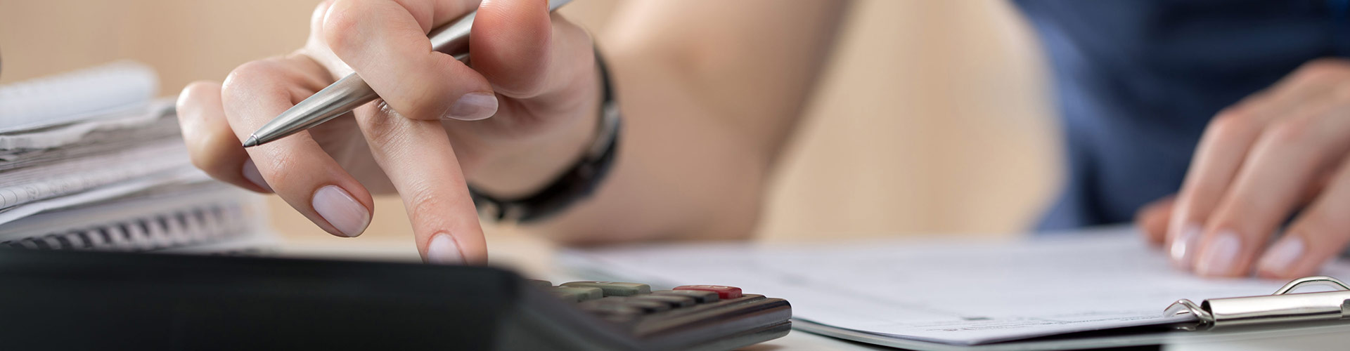 Woman Making Quote Calculations